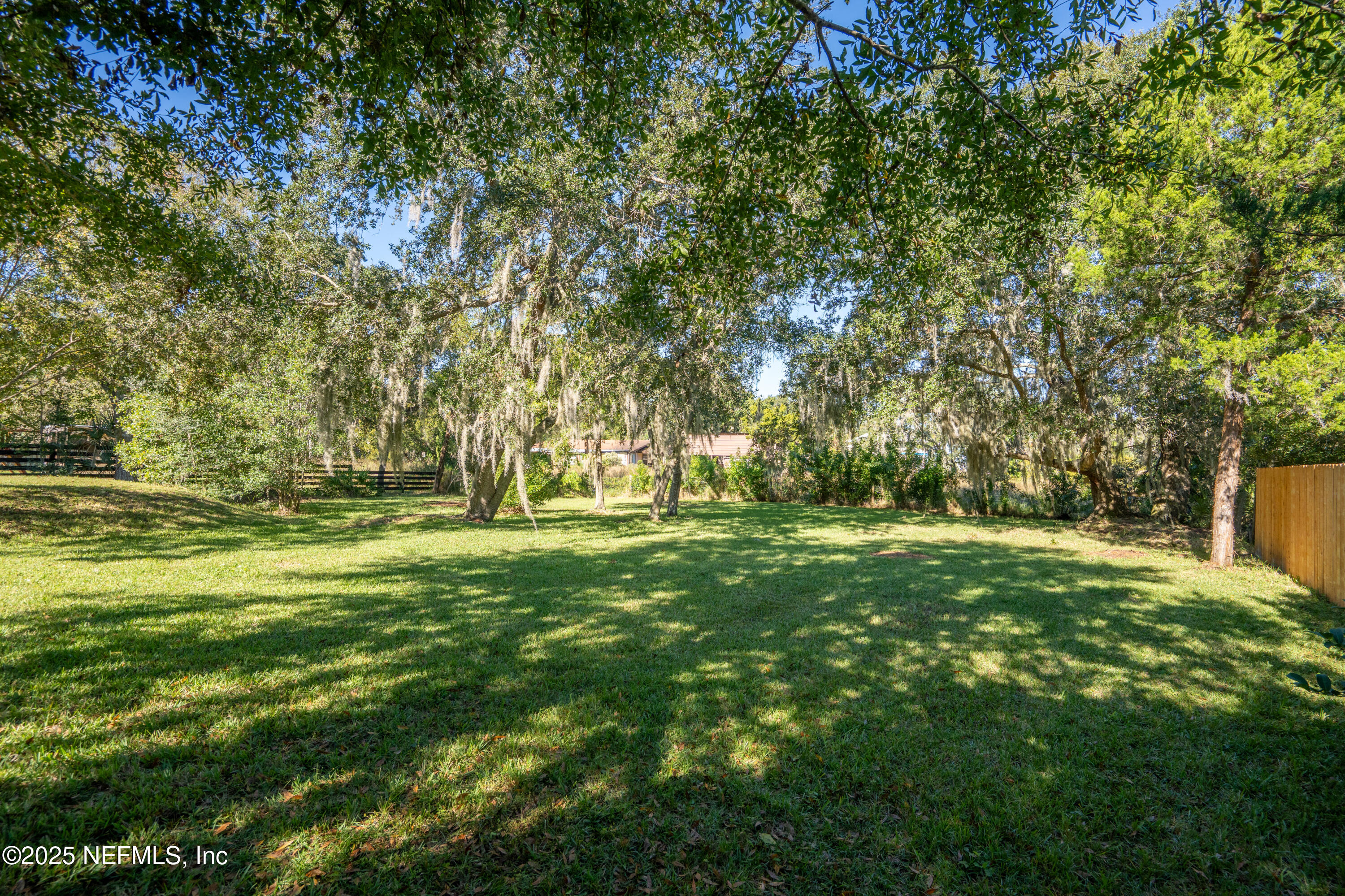 4187 Quail Drive St. Augustine, FL 32084 - Photo 37 of 38 a view of outdoor space with trees all around