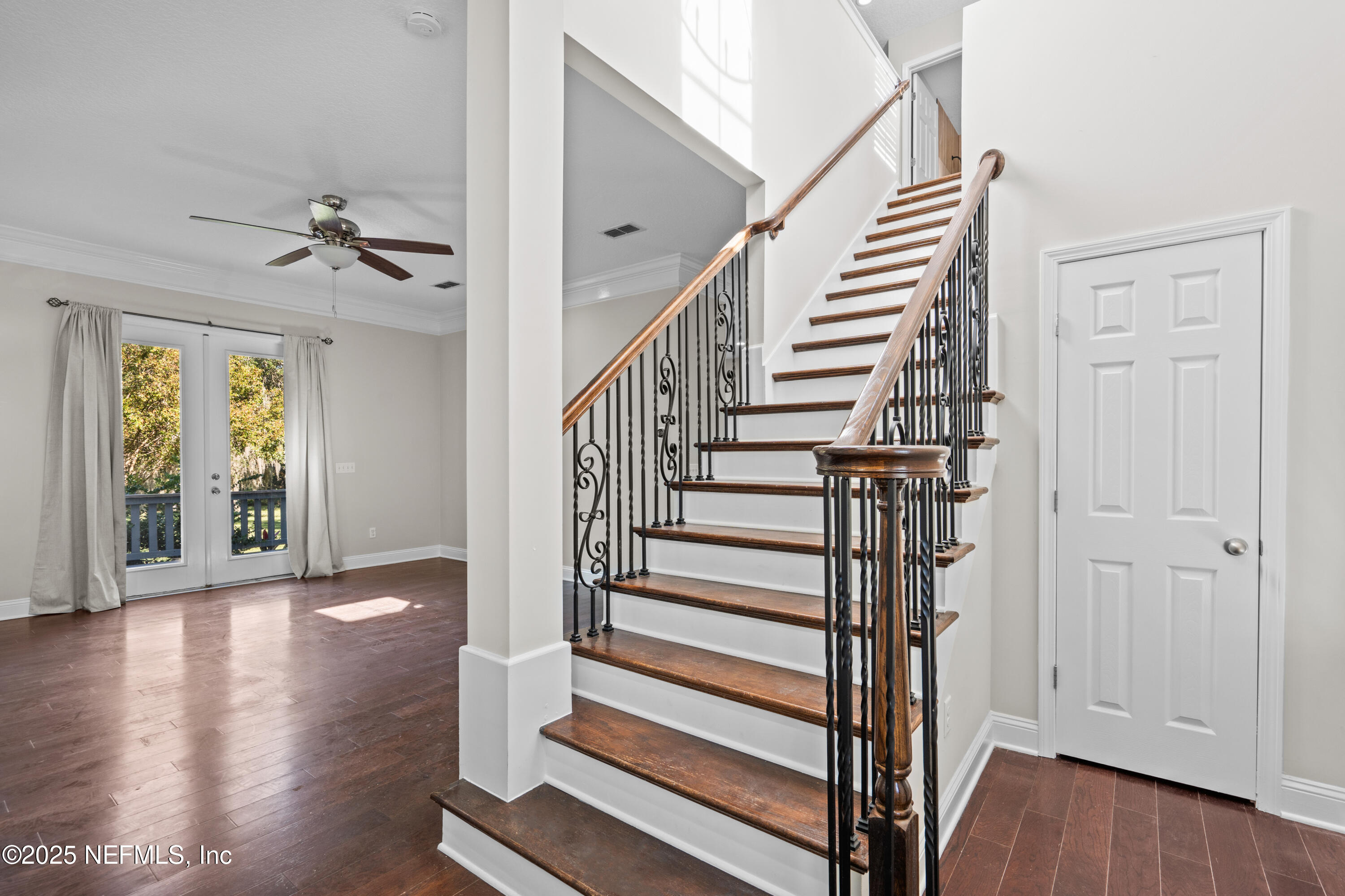 4187 Quail Drive St. Augustine, FL 32084 - Photo 4 of 38 a view of entryway with wooden floor and stairs
