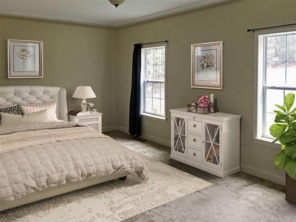 1316 Miles Jackson Road Palmyra, VA 22963 - Photo 15 of 22 a bedroom with a bed and a window