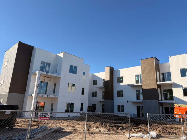 1652 North Main Street, Unit 30 Layton, UT 84041 - Photo 4 of 4 Multi-story building featuring white horizontal siding and brown vertical siding accents