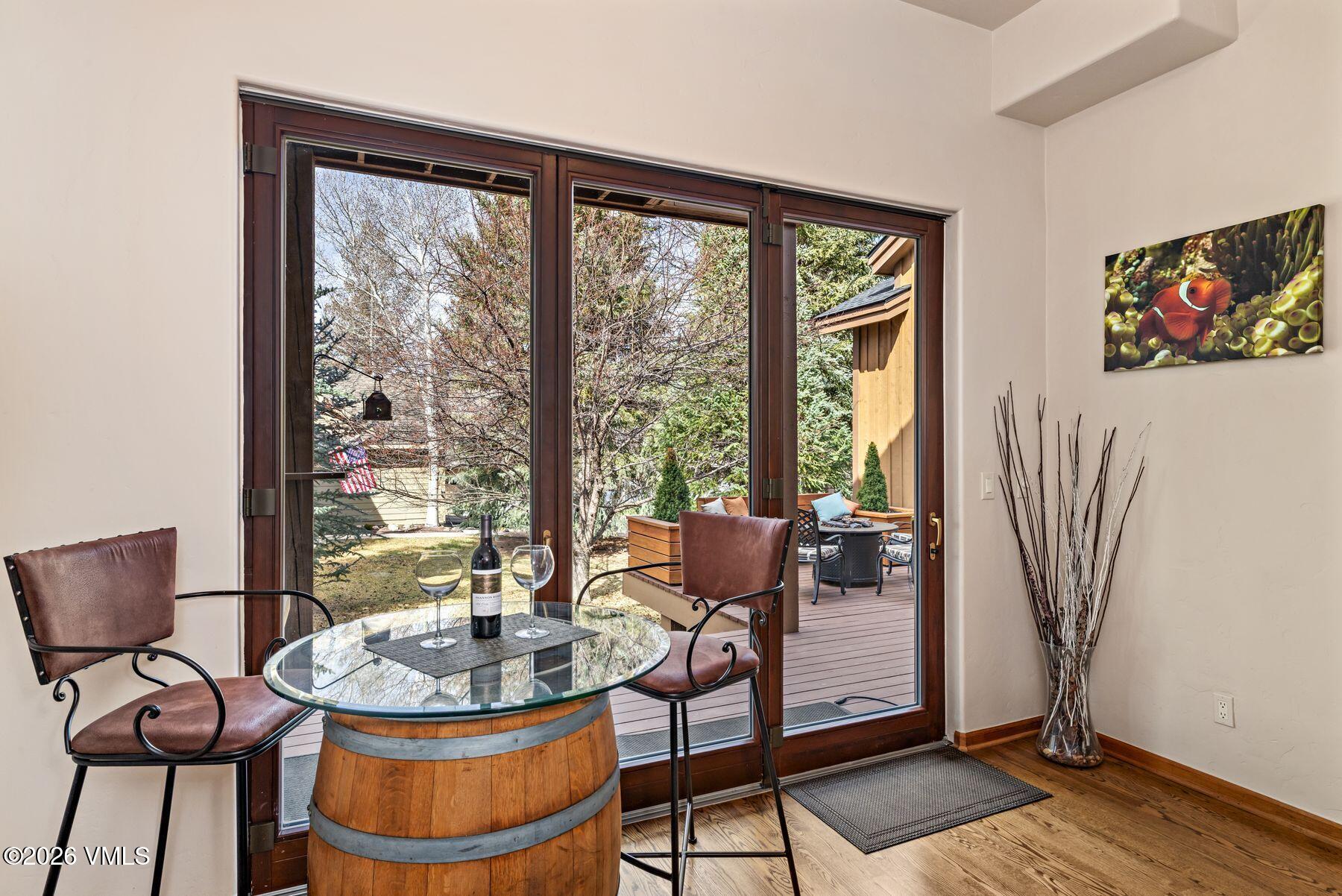 91 Creamery Trail Edwards, CO 81632 - Photo 16 of 44 a living room with furniture and a floor to ceiling window