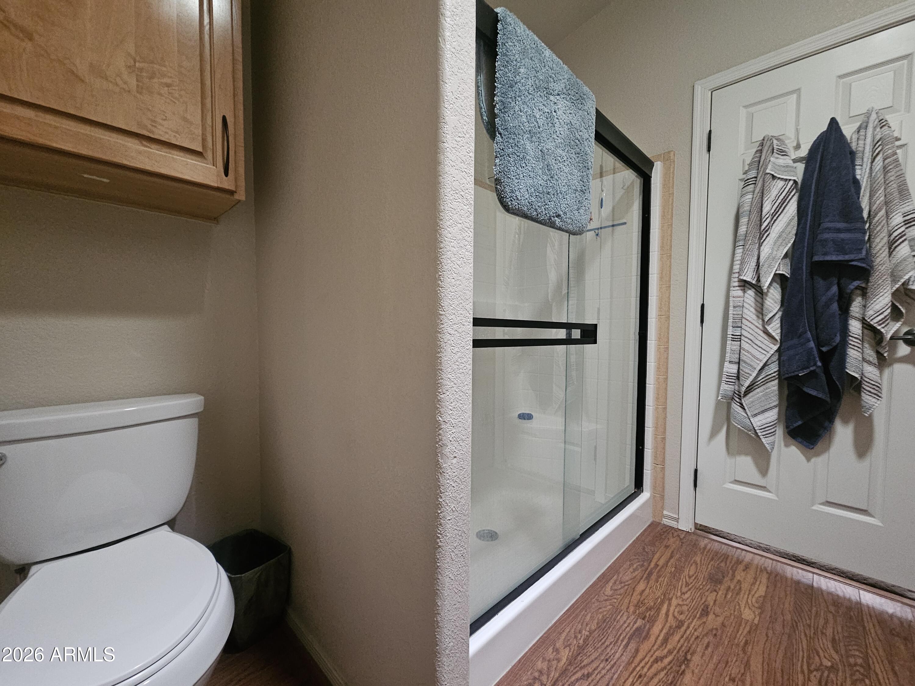 650 North Hawes Road, Unit 4410 Mesa, AZ 85207 - Photo 22 of 40 a bathroom with a toilet and a shower