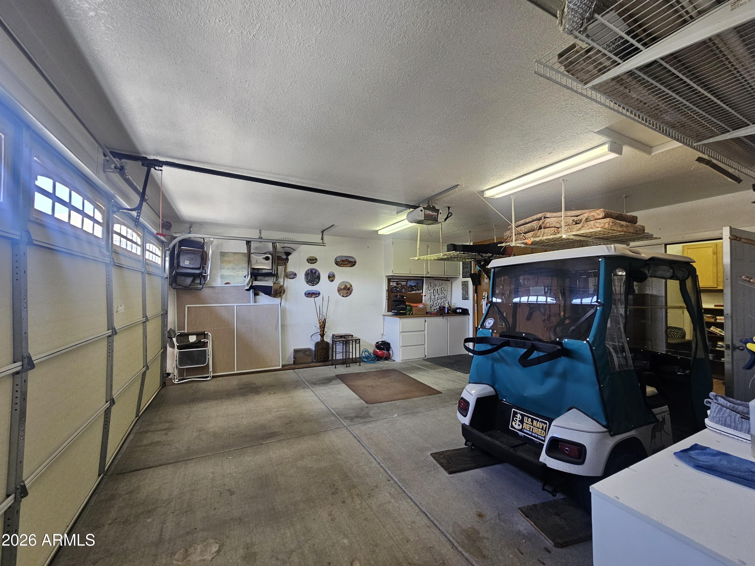650 North Hawes Road, Unit 4410 Mesa, AZ 85207 - Photo 24 of 40 a view of a room with gym equipment