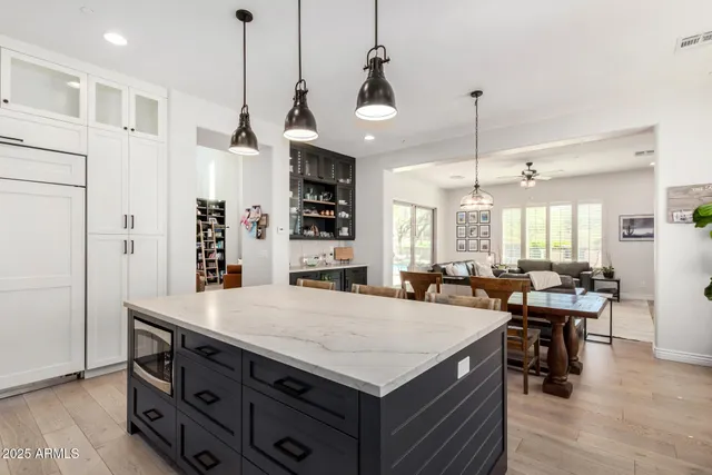 a kitchen with sink cabinets and window
