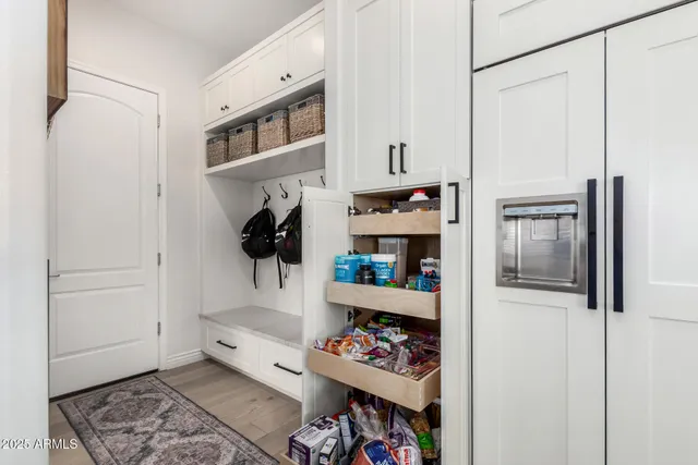 a living room with furniture fireplace and flat screen tv
