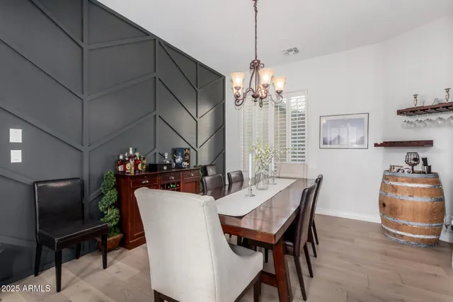 a bathroom with a sink vanity and a mirror