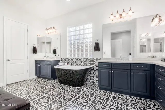 a livingroom with a bookshelf and a workspace