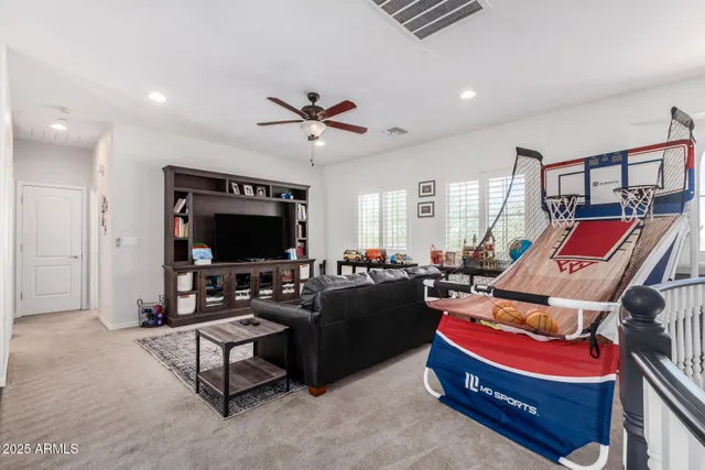 a bathroom with a double vanity sink mirror and shower