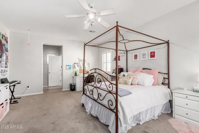 a view of house with yard and sitting area