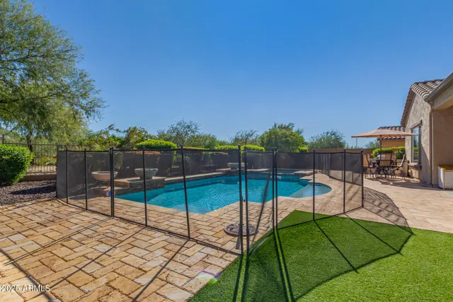 a view of a road with a building in the background