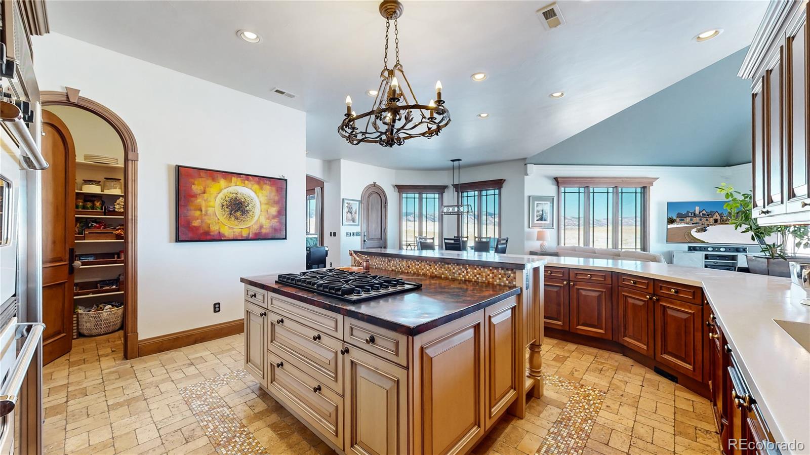 7755 North Moore Road Littleton, CO 80125 - Photo 11 of 46 a kitchen that has a stove and a sink