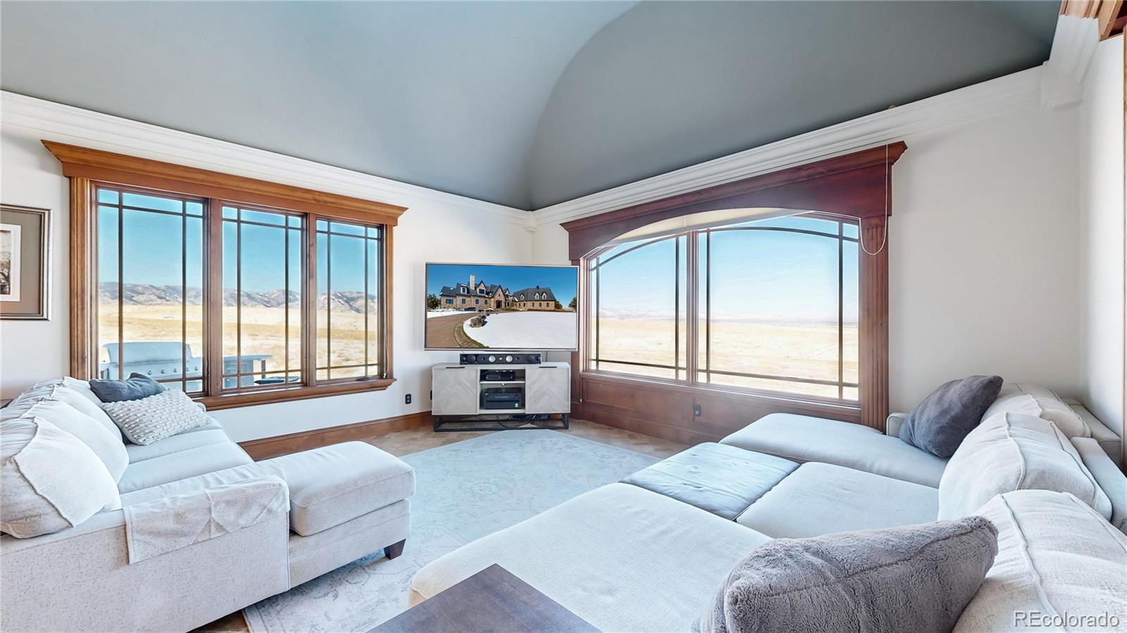 7755 North Moore Road Littleton, CO 80125 - Photo 14 of 46 a living room with furniture and a large window