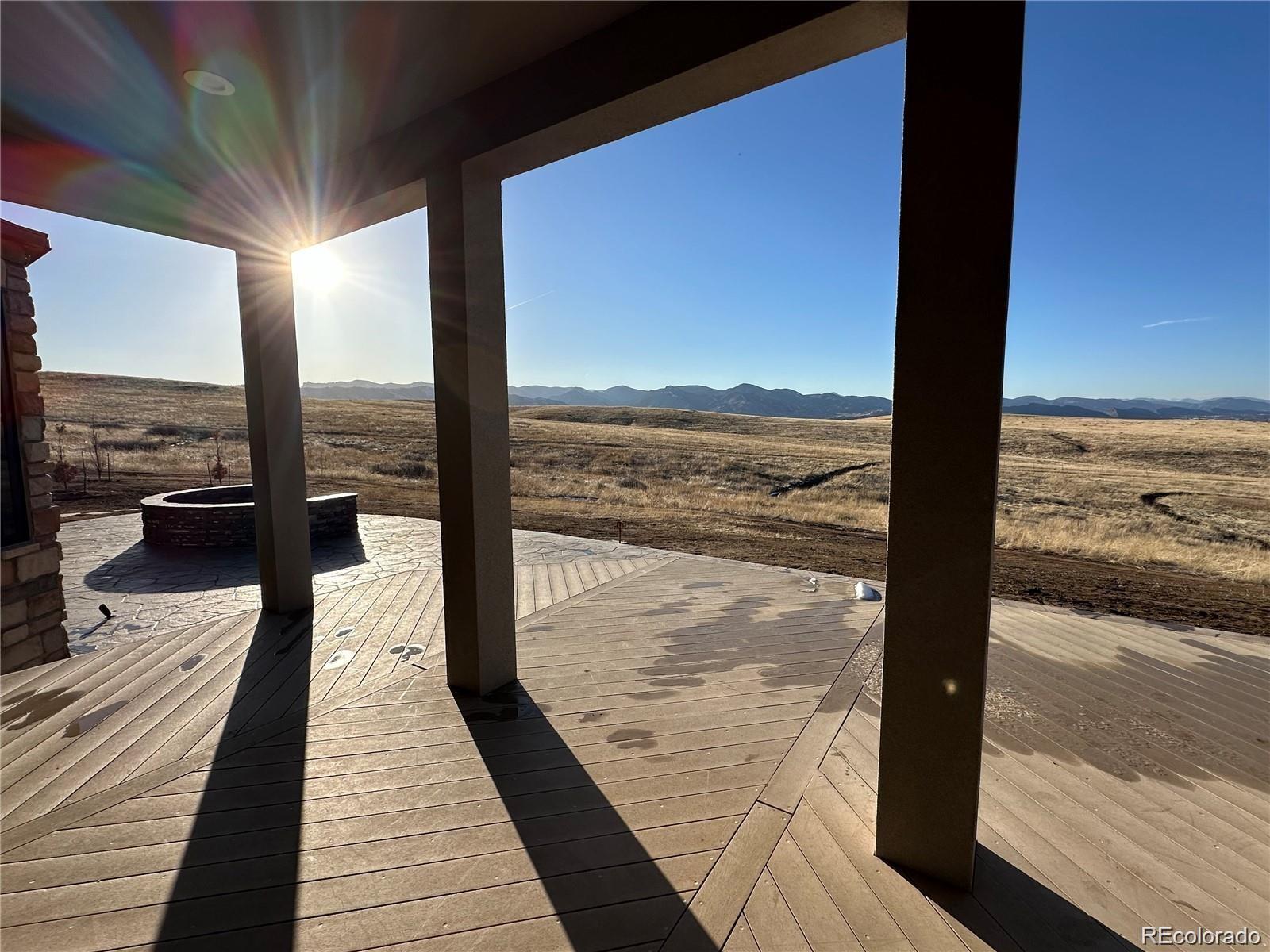 7755 North Moore Road Littleton, CO 80125 - Photo 32 of 46 a view of ocean from a balcony