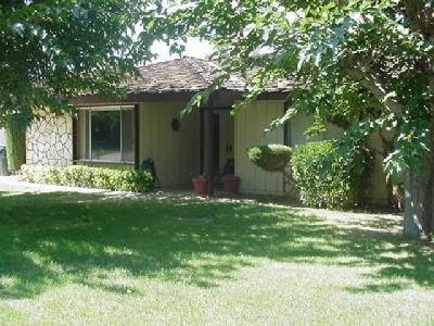 15848 Rimrock Road Apple Valley, CA 92307 - Photo 1 of 1 a view of a house with a yard