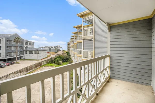 a view of a balcony with city view