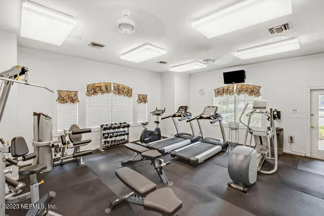 a view of a room with gym equipment