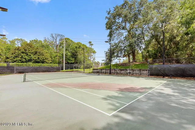 a view of outdoor space and basketball court
