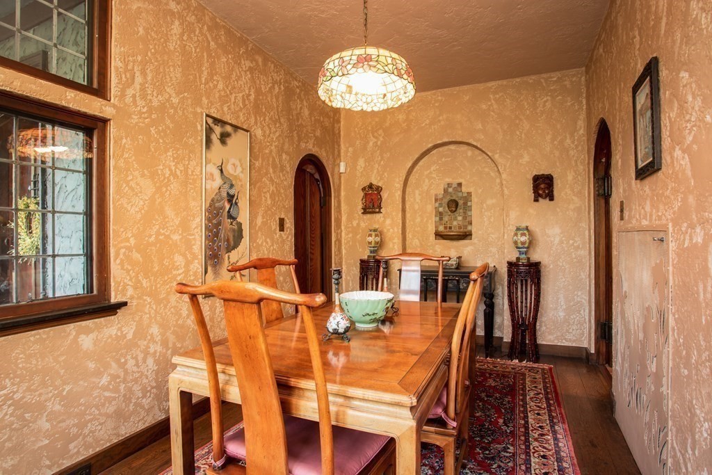 17 Longview Road Reading, MA 01867 - Photo 11 of 42 a view of a dining room with furniture and a chandelier