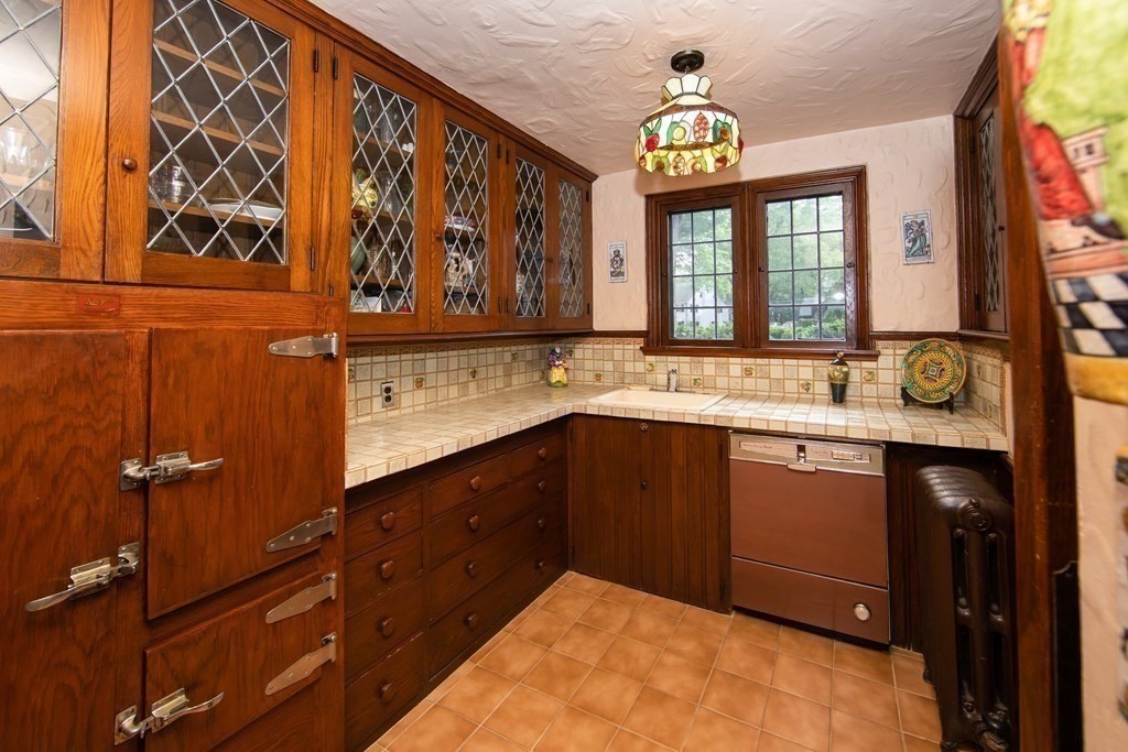 17 Longview Road Reading, MA 01867 - Photo 12 of 42 a kitchen with a sink and a window