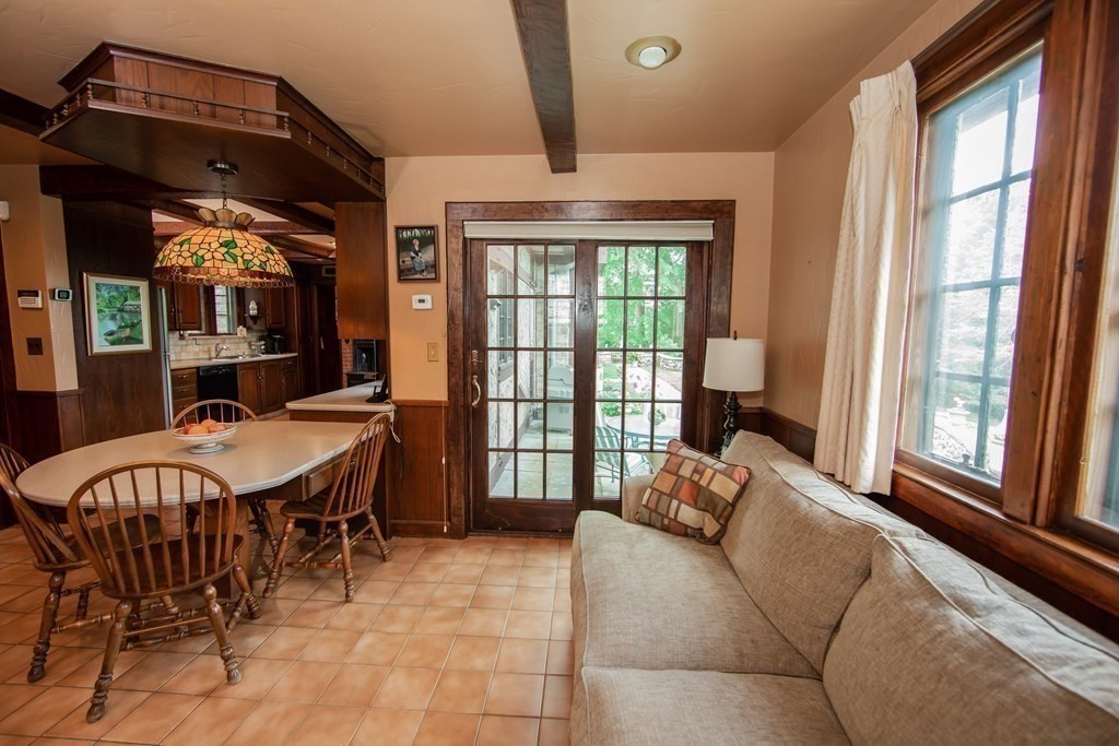 17 Longview Road Reading, MA 01867 - Photo 15 of 42 a living room with furniture and a large window