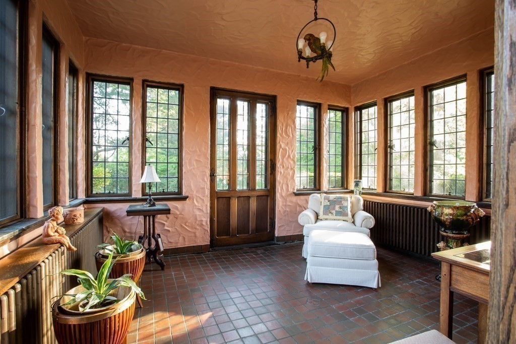 17 Longview Road Reading, MA 01867 - Photo 20 of 42 a living room with furniture and floor to ceiling windows