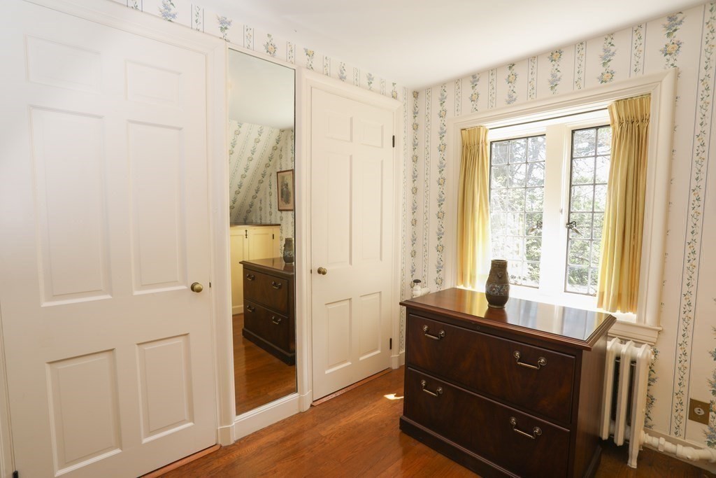 17 Longview Road Reading, MA 01867 - Photo 25 of 42 a room with a dresser and a mirror