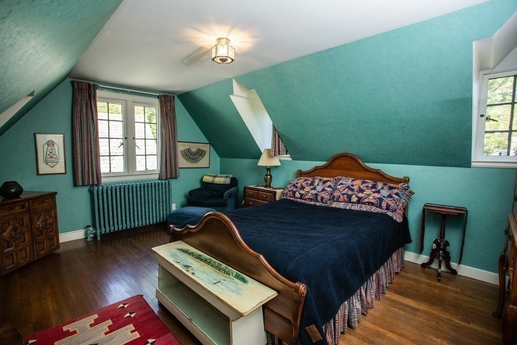 17 Longview Road Reading, MA 01867 - Photo 33 of 42 a living room with furniture and a fireplace