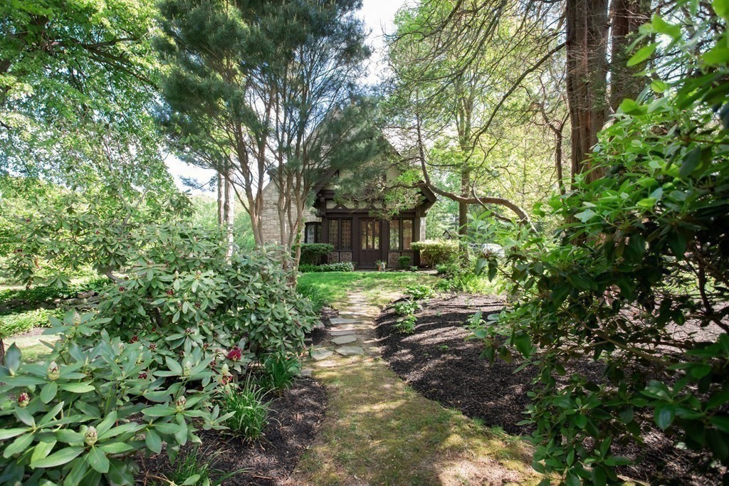 17 Longview Road Reading, MA 01867 - Photo 35 of 42 a backyard of a house with lots of green space