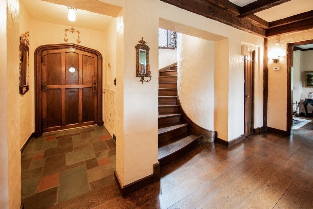 17 Longview Road Reading, MA 01867 - Photo 5 of 42 a view of a hallway with wooden floor and entryway