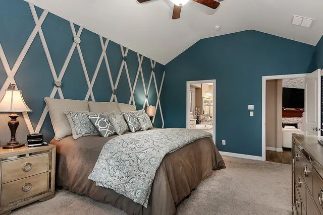 a bedroom with a bed and a cabinets