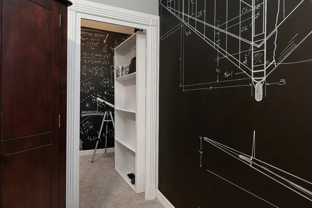 a en suite bathroom with a sink and a mirror