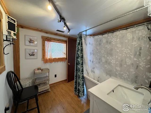 a view of swimming pool with a patio