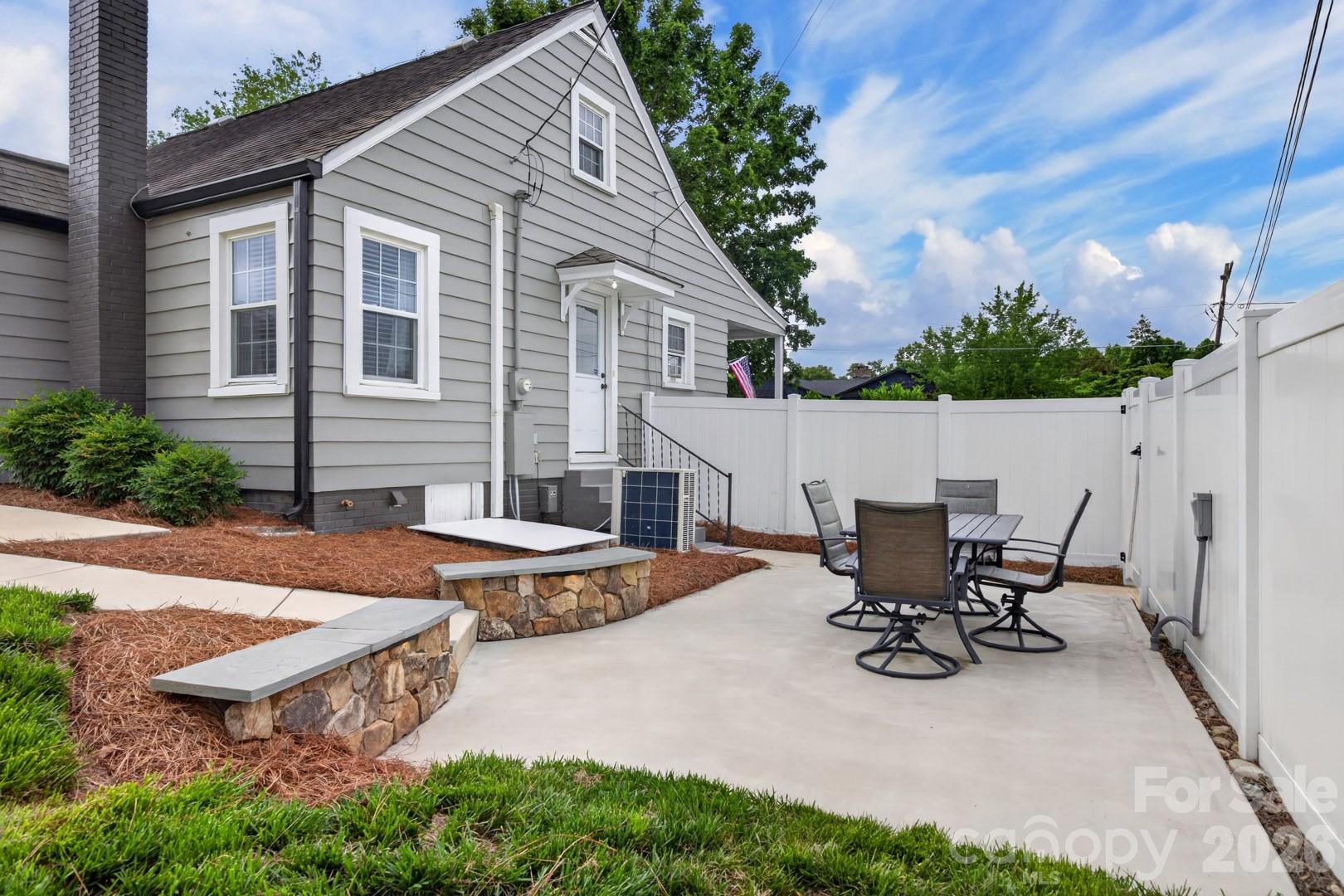 1016 Raney Street Salisbury, NC 28146 - Photo 24 of 45 a view of a house with patio and a yard