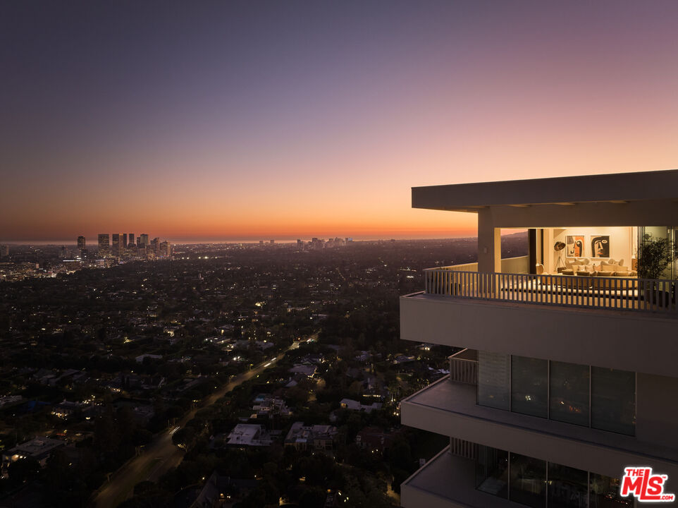a view of a balcony with an outdoor space