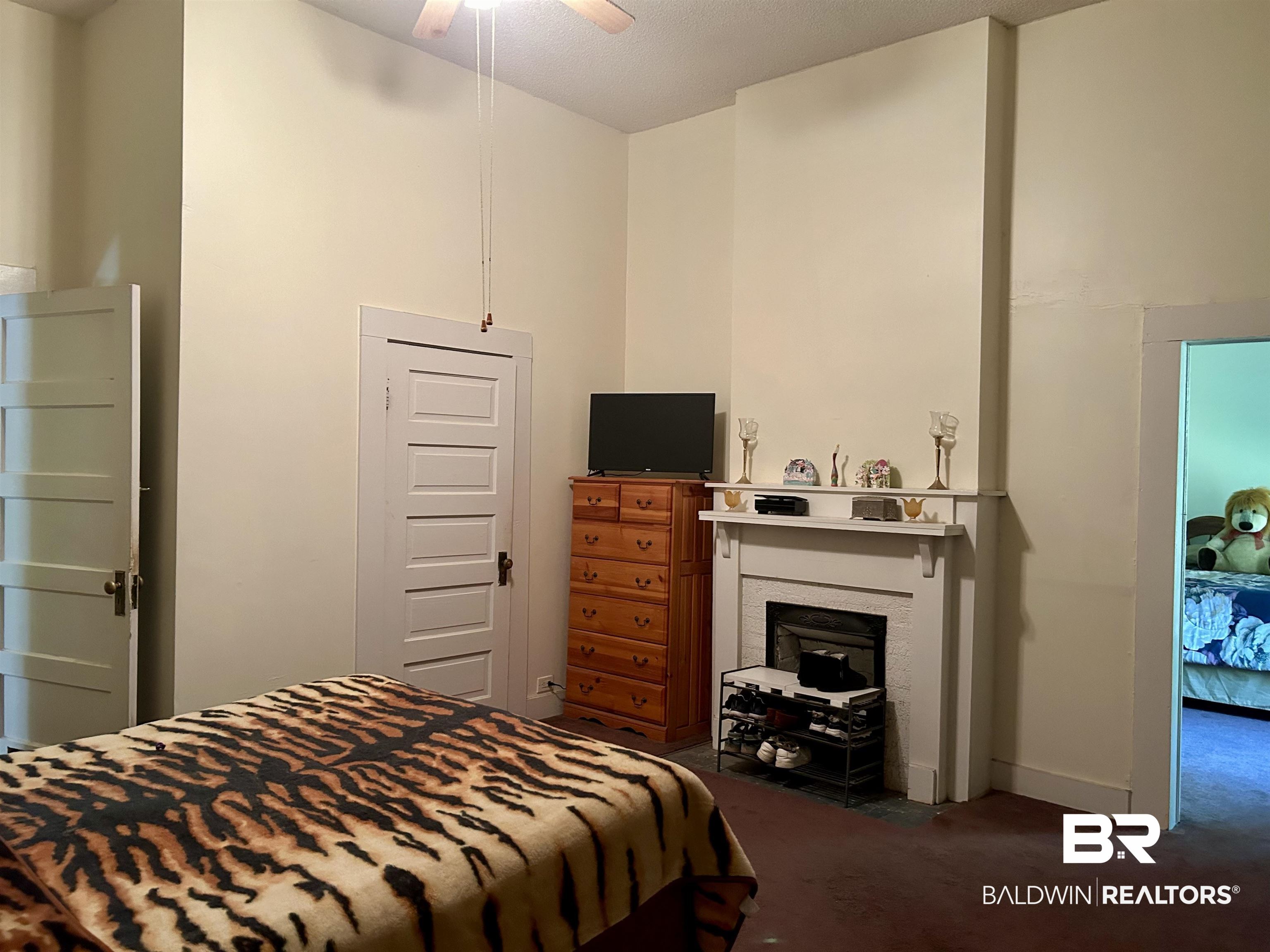 405 North Wasson Avenue Mobile, AL 36612 - Photo 20 of 26 Bedroom featuring ceiling fan and dark carpet