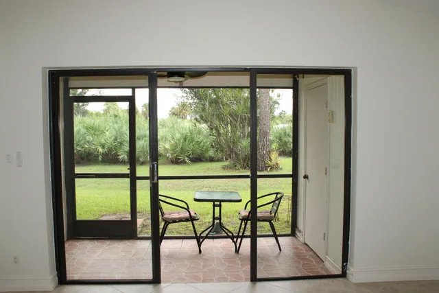 a view of an outdoor space with a large window