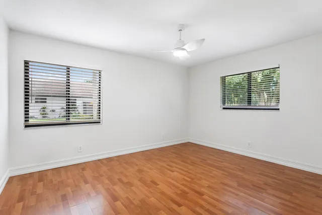 a view of balcony with yard