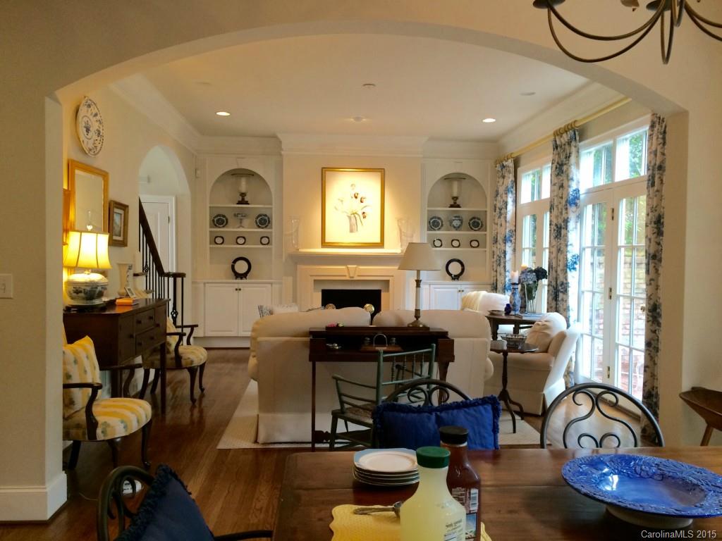 2138 Harris Road Charlotte, NC 28211 - Photo 3 of 17 a living room with furniture a dining table and wooden floor