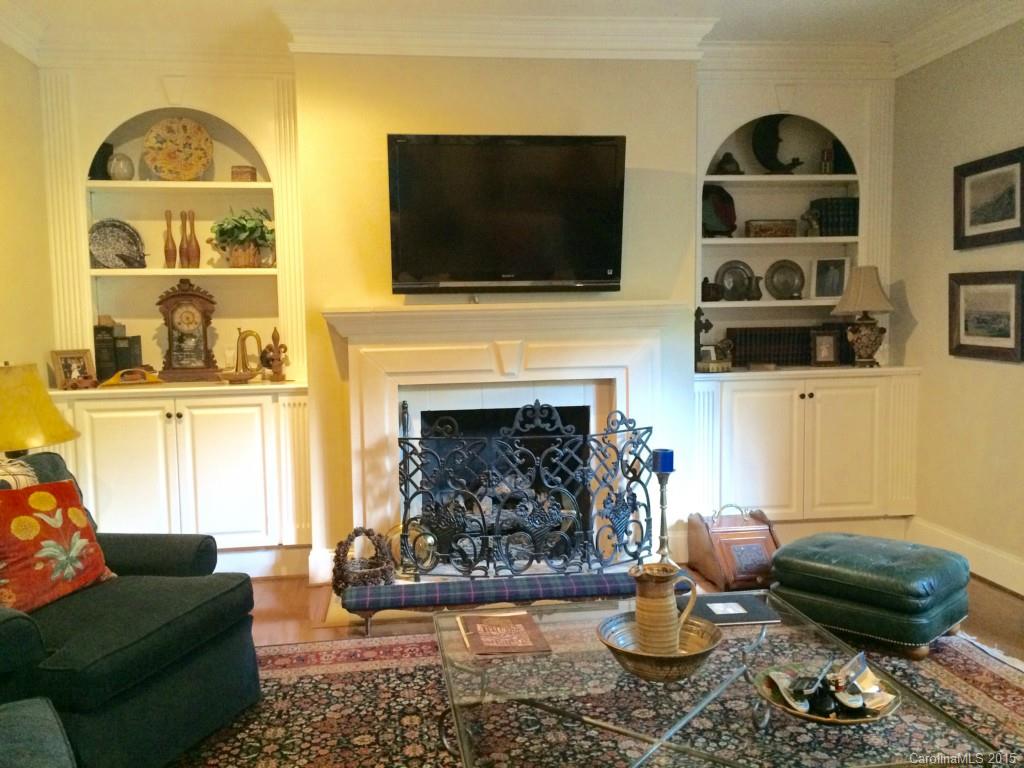 2138 Harris Road Charlotte, NC 28211 - Photo 4 of 17 a living room with furniture and a fireplace