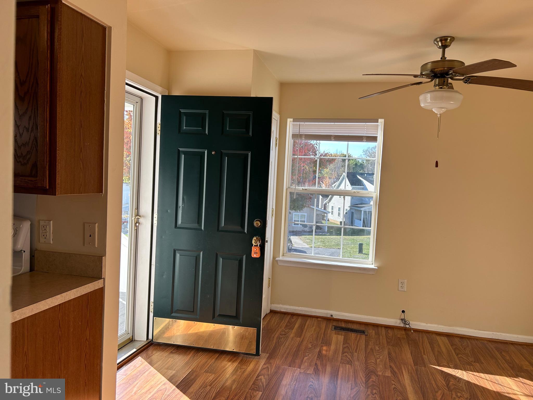 981 Main Avenue Hagerstown, MD 21740 - Photo 15 of 39 a view of a hallway with wooden floor and a bathroom