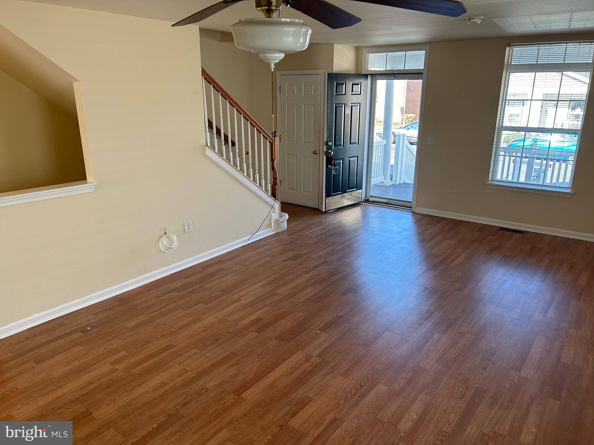 981 Main Avenue Hagerstown, MD 21740 - Photo 3 of 39 a view of an empty room with wooden floor and a window