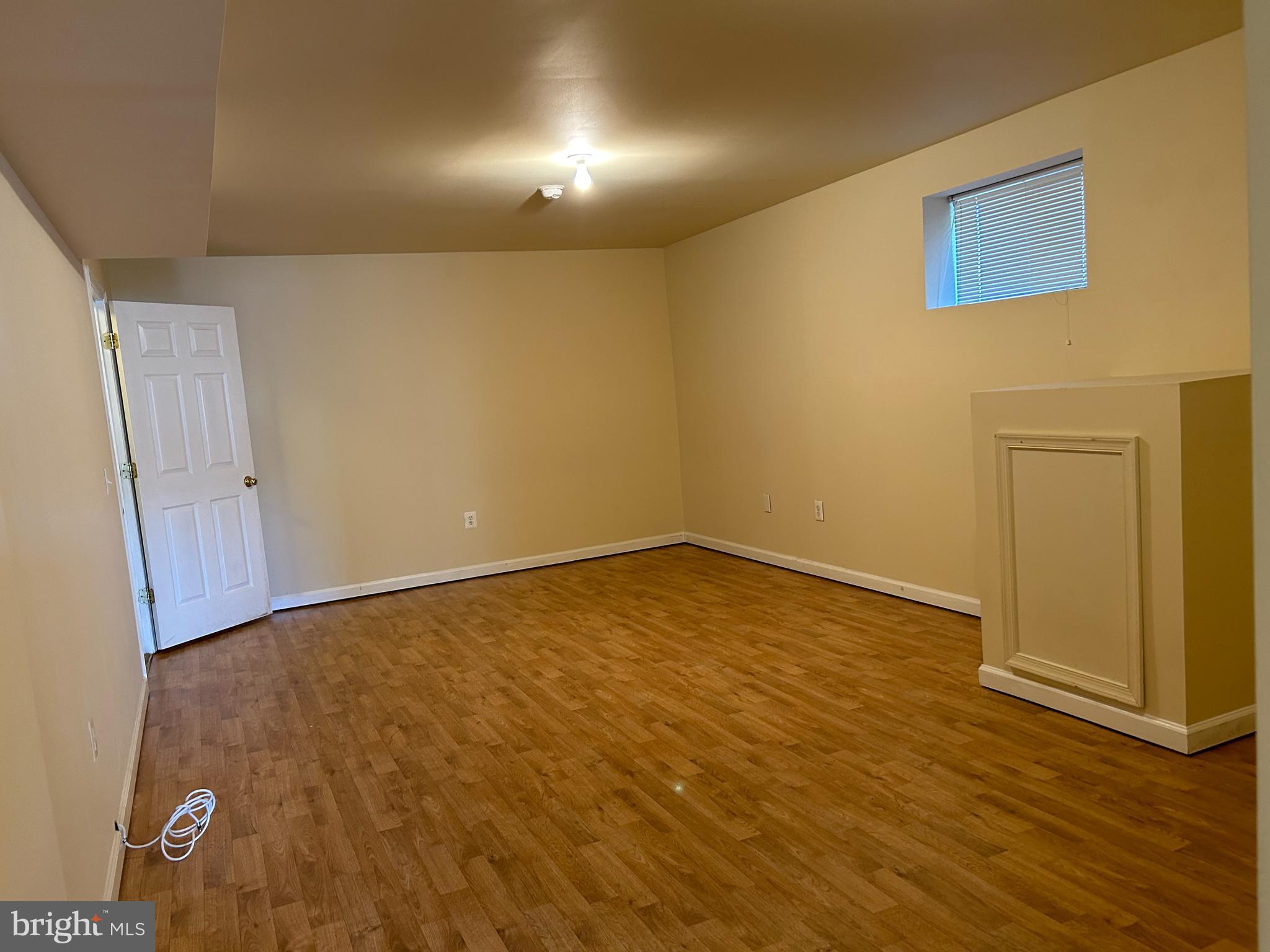 981 Main Avenue Hagerstown, MD 21740 - Photo 32 of 39 an empty room with wooden floor