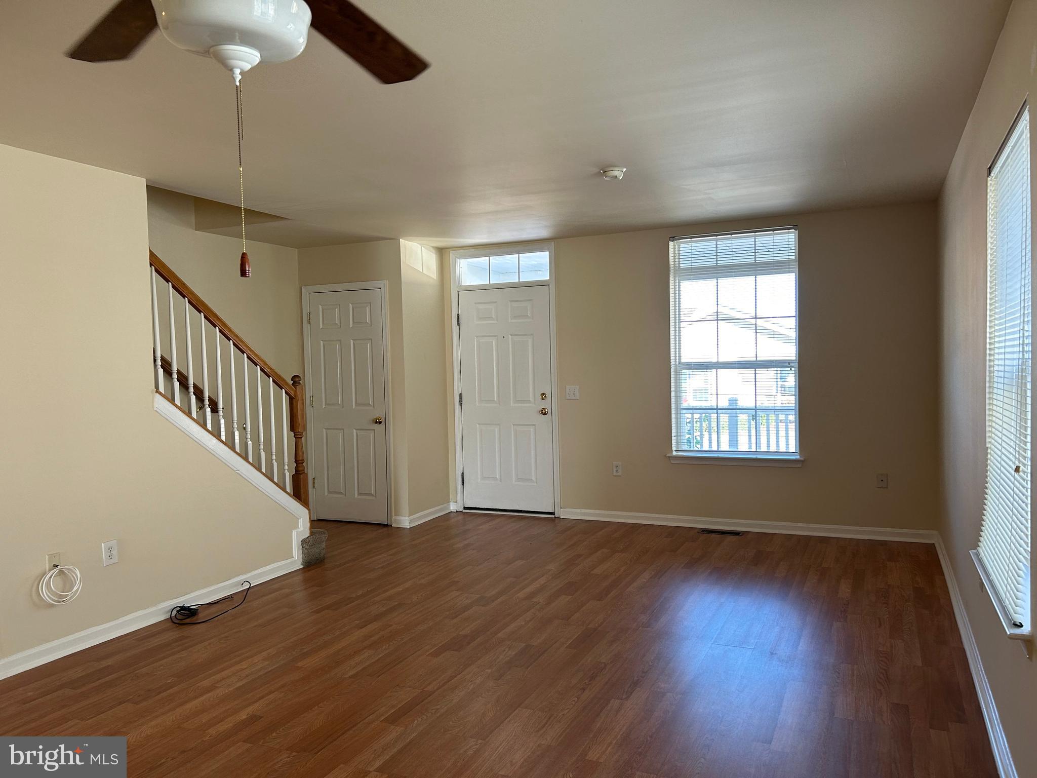 981 Main Avenue Hagerstown, MD 21740 - Photo 9 of 39 wooden floor in an empty room with a window