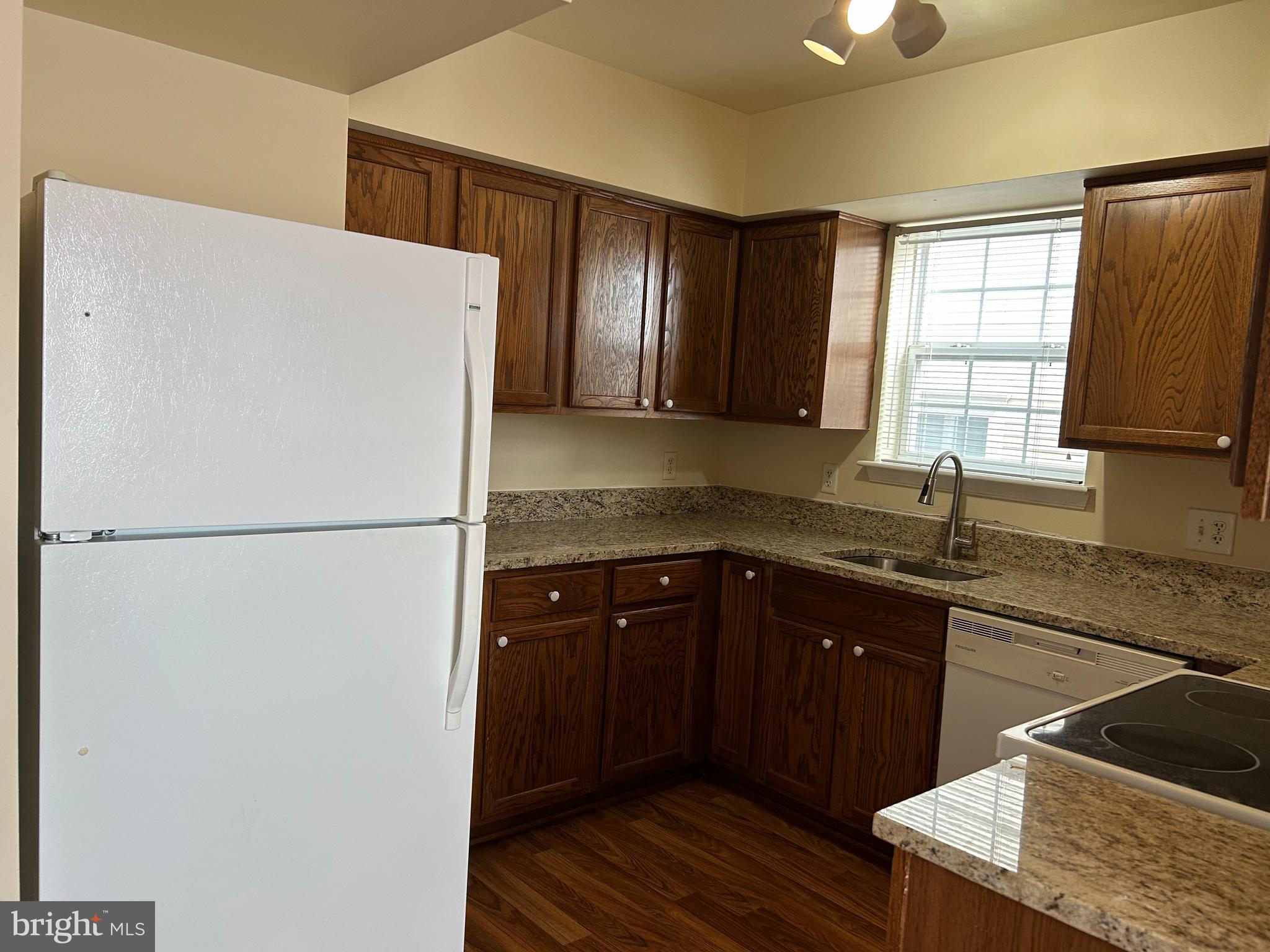 981 Main Avenue Hagerstown, MD 21740 - Photo 10 of 39 a kitchen with a refrigerator and a sink