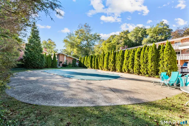 a view of a room with large windows
