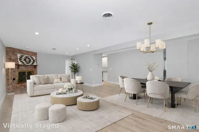 an aerial view of a house with a swimming pool