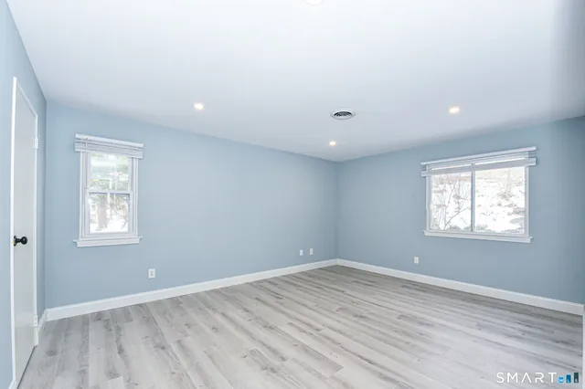a kitchen with stainless steel appliances a refrigerator and a stove