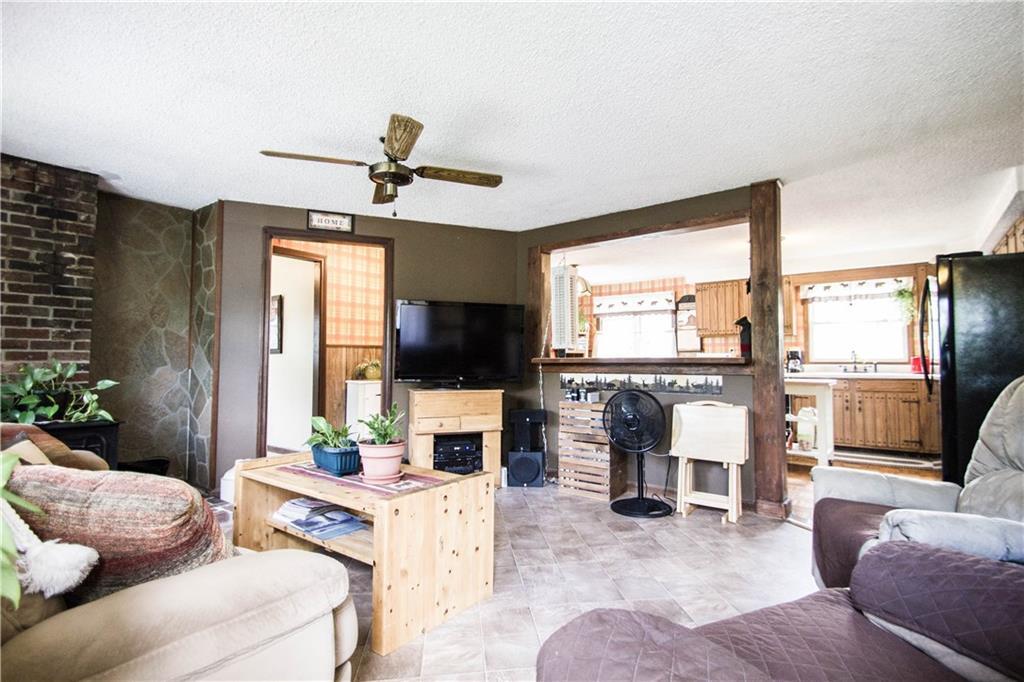 217 Dirigo Road China, ME 04358 - Photo 22 of 35 Living room with large opening to...