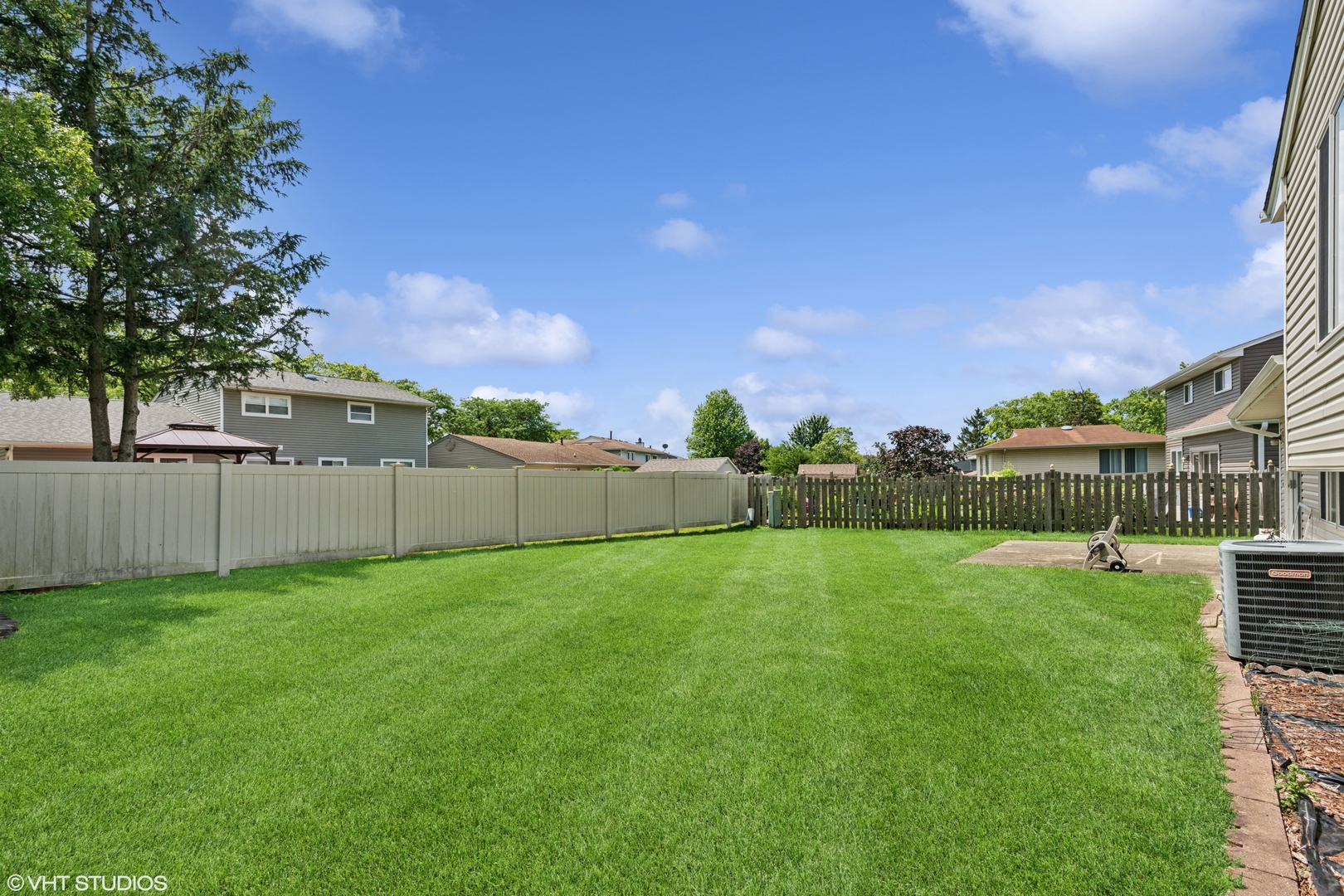 795 Hunter Drive Roselle, IL 60172 - Photo 22 of 26 a view of a backyard