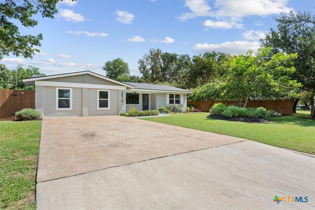 2810 Lilac Lane Temple, TX 76502 - Photo 3 of 40 a front view of house with yard and green space